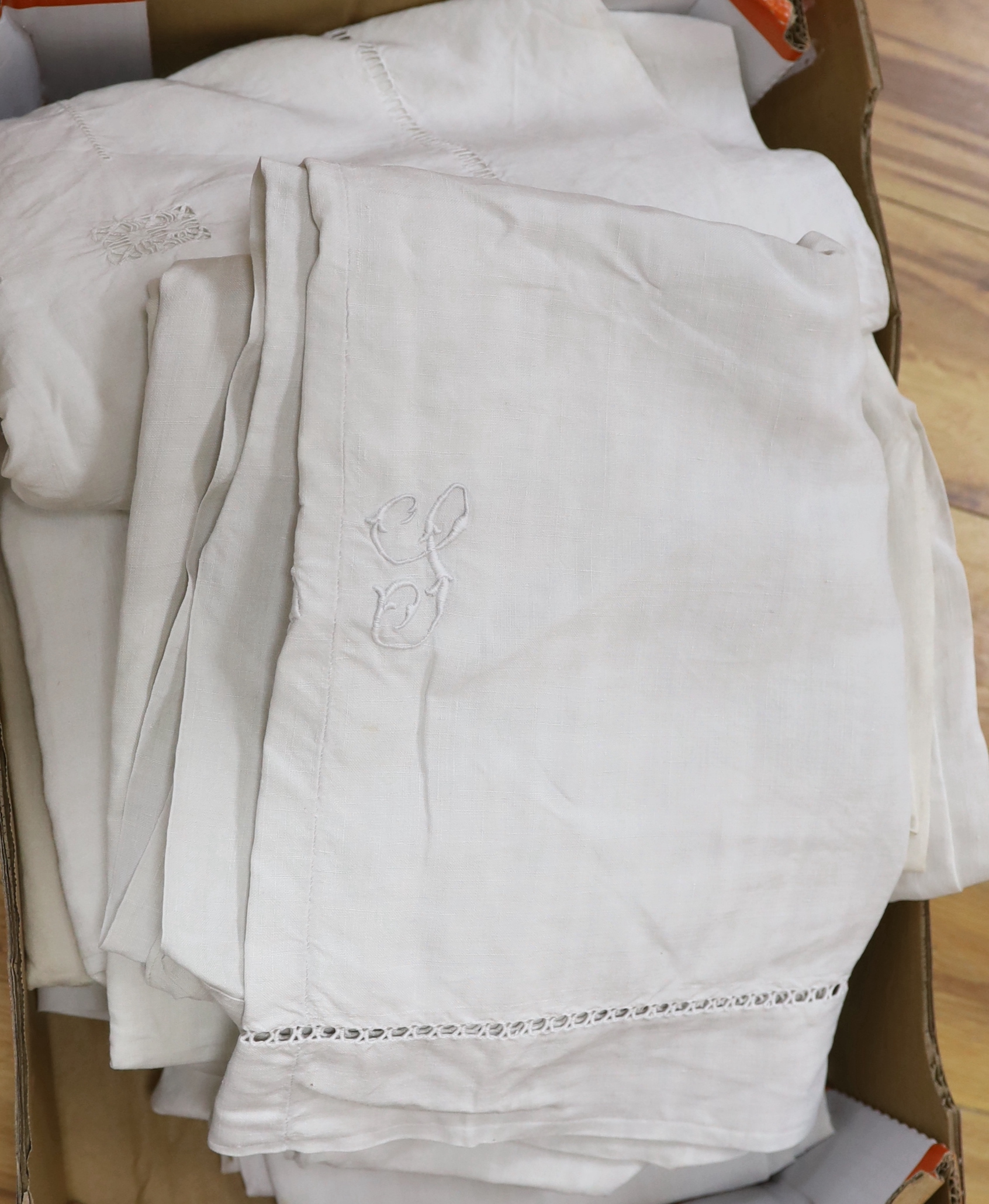 Six coarse French provincial linen sheets, button holed and embroidered monogrammed turn backs